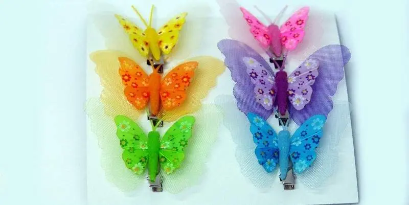 Декоративные материалы Бабочка на клипе (ткань) 80мм 
